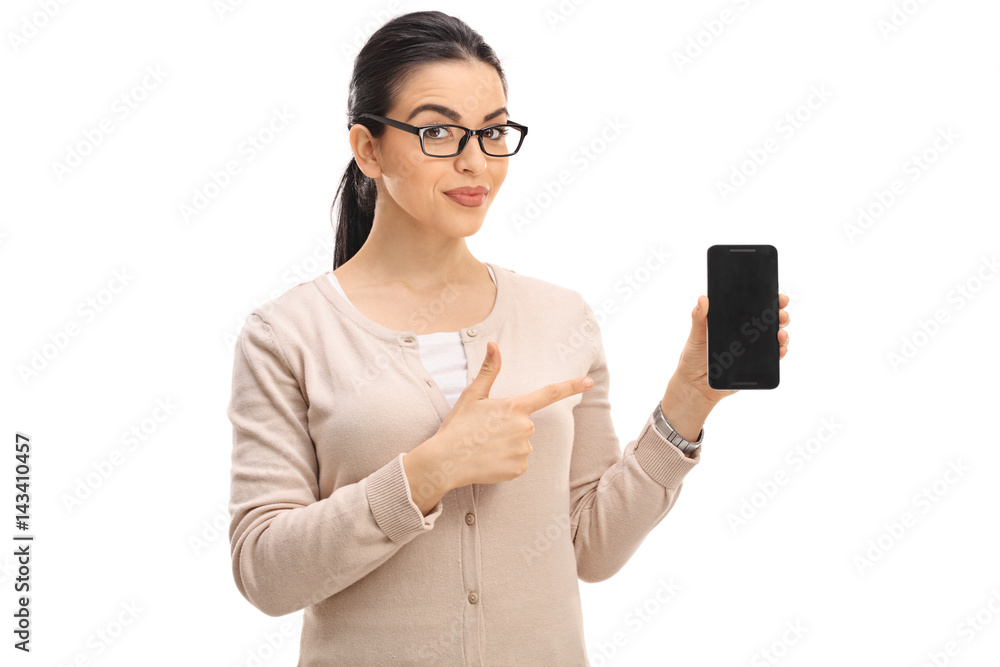 Smart looking woman showing a phone and pointing Smart looking woman showing a phone and pointing