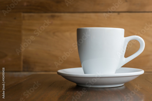 Hot coffee on a wooden table