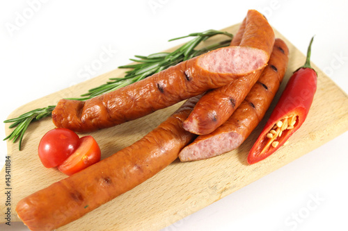 Grilled sausages with rosemary and hot peppers