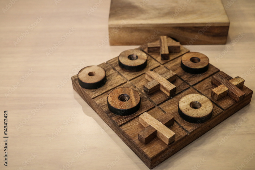 right or wrong with tic tac toe game on the wood table right or wrong with tic tac toe game on the wood table