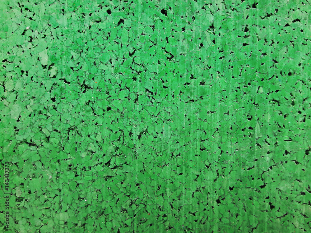 Green textural background. Rubber coating green. Green textural background. Rubber coating green.