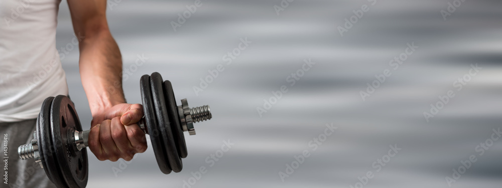 © thodonal - Arm lifting dumbbell