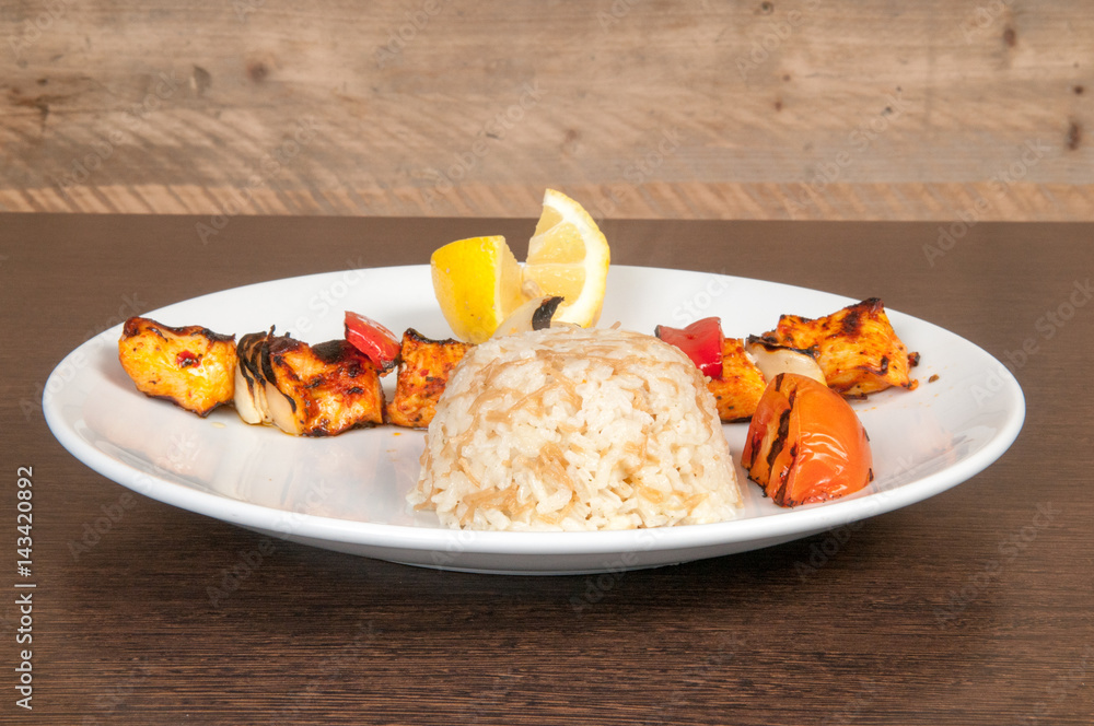 Grilled meat dish of shish kebab with onion