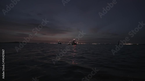boats at sea at night