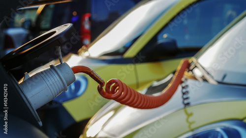 Power supply for electric car charging. City electric car charging station. Close-up.