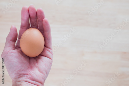 The chicken egg in the hand. Easter time, Happy time. Jesus rise again