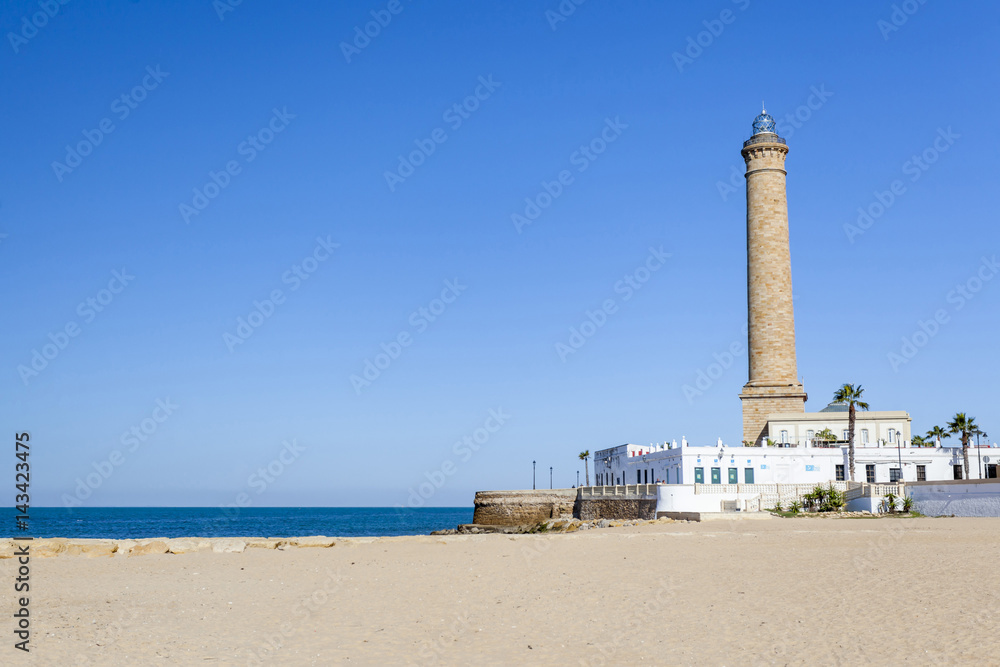 Lighthouse and beach,Chipiona, Andalucia,Spain. Lighthouse and beach,Chipiona, Andalucia,Spain.