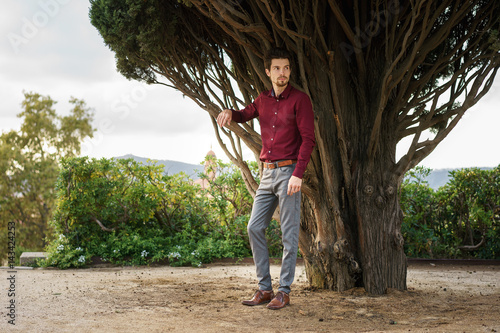 Young man posing confidently