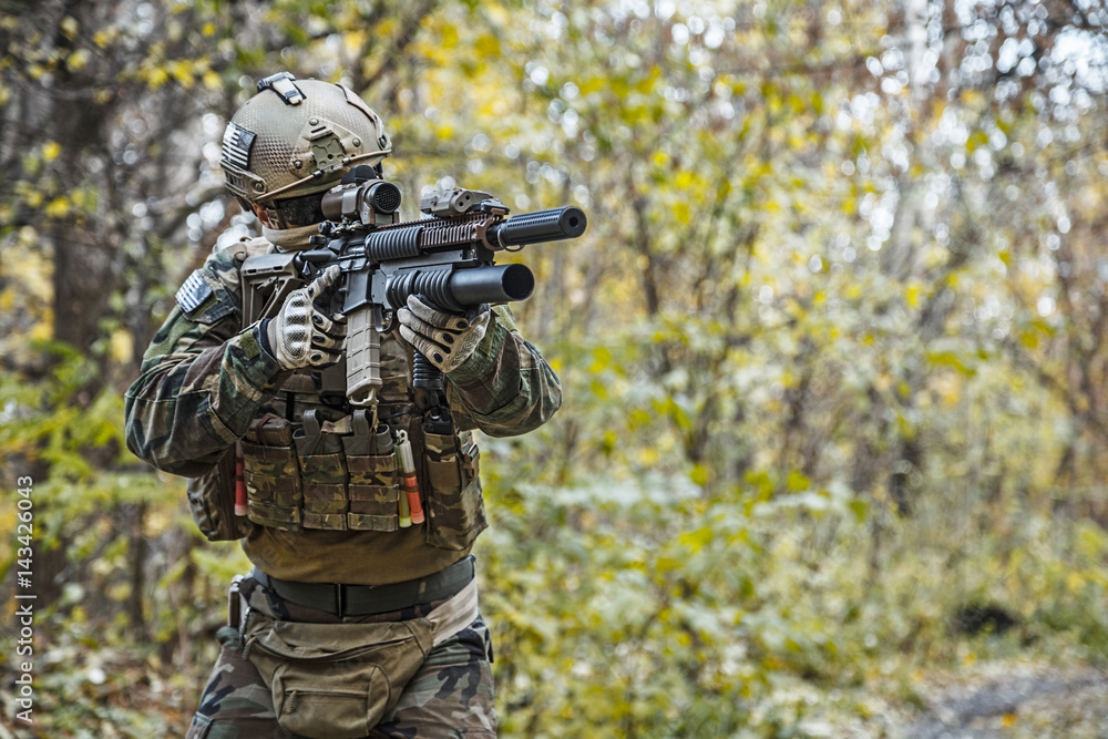 United states Marine Corps special operations command Marine Special Operator also known as Marsoc raider wearing camouflage uniforms in the forest