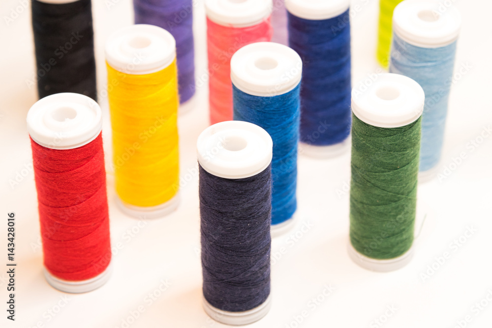 bobbins with sewing thread in many different colors bobbins with sewing thread in many different colors