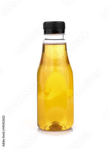 Bottle of honey isolated on white