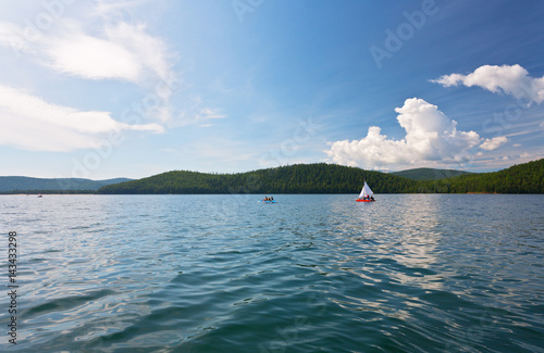 Lake Baikal in the summer. Traveling along Chivyrkuy Bay photo