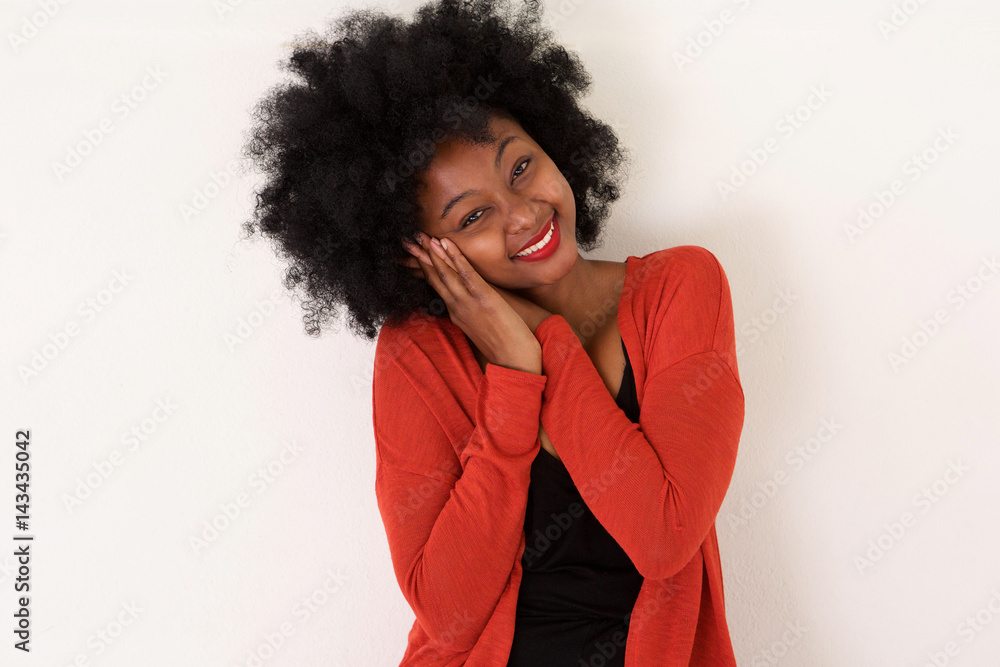 cute african american woman smiling with head on hands cute african american woman smiling with head on hands