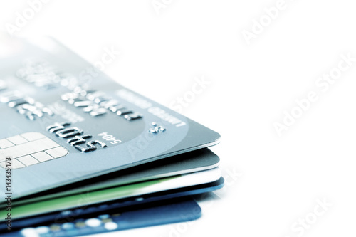 Credit cards stacked on white background