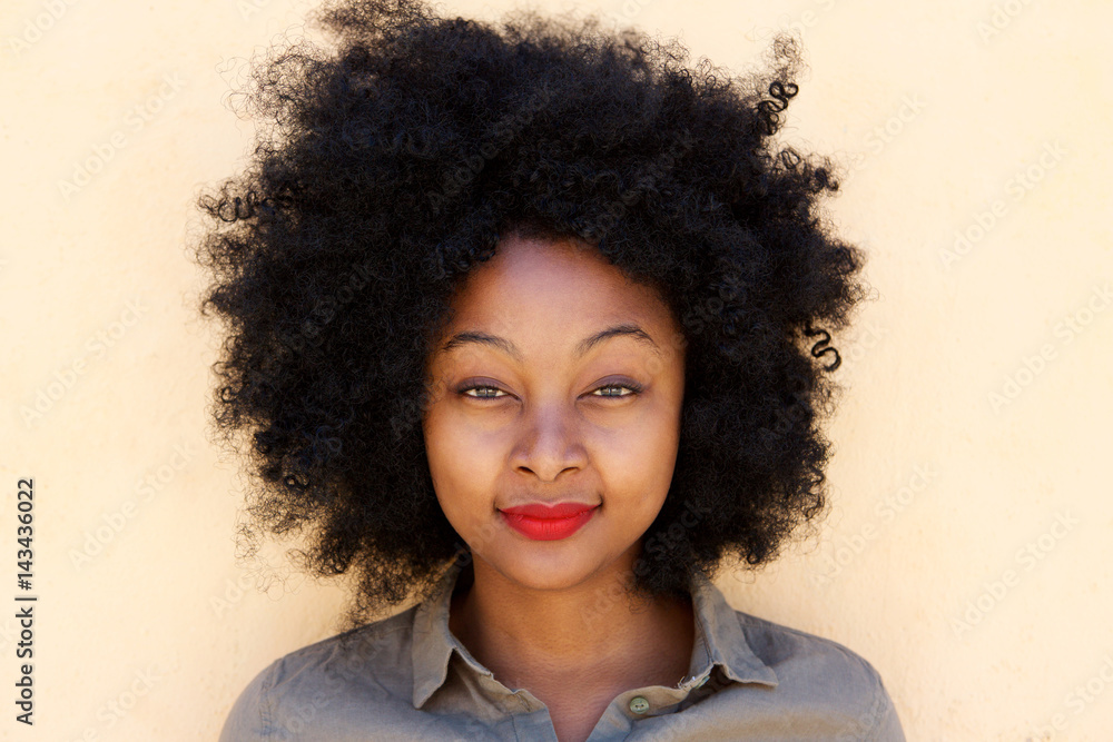 Close up attractive young woman standing and smiling Close up attractive young woman standing and smiling