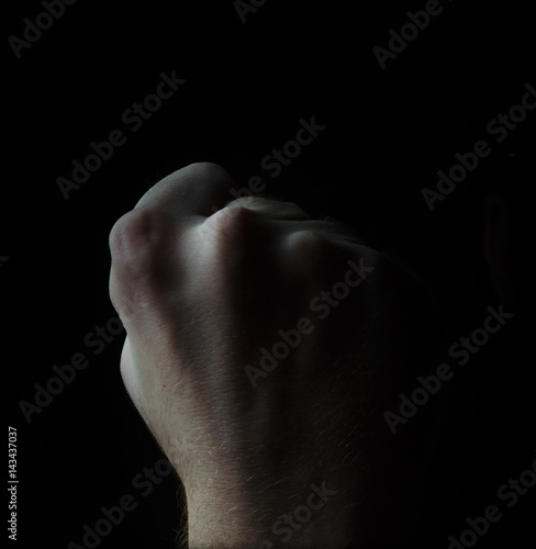  Male Fist On Black Background 