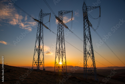 Eletric pylons at sunset
