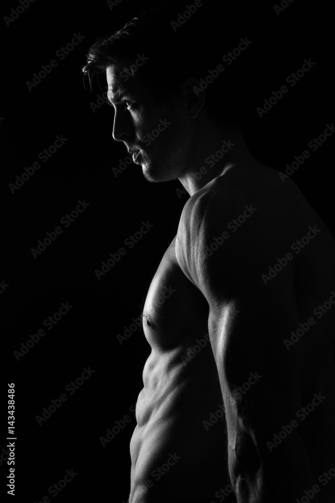 Sexy Shirtless Muscular Male Model on Black Background