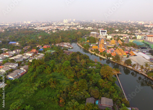 The aerial view of the green spaces and canals of Bangkok' suburbs, Thailand 