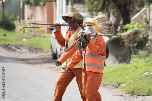 Ethiopian Street Cleaner in uniform walking on road in Addis Ababa