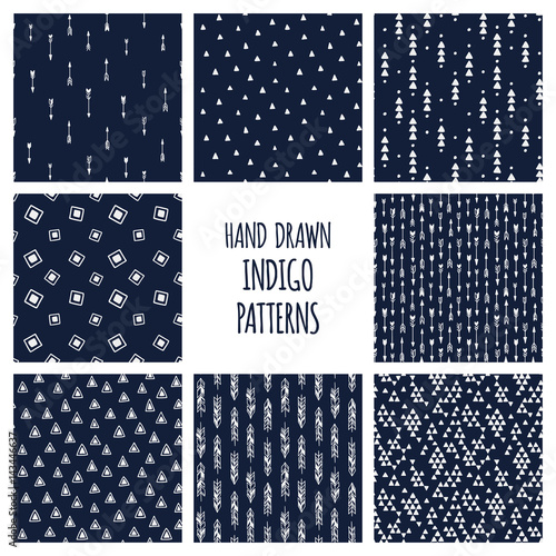 Dark blue indigo set of patterns. Hand drawn vector triblal backgrounds with triangles and arrows.