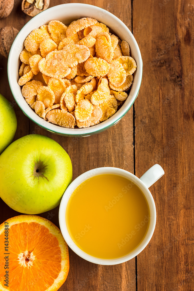 Healthy home made breakfast of muesli, apples, fresh fruits and walnuts Healthy home made breakfast of muesli, apples, fresh fruits and walnuts