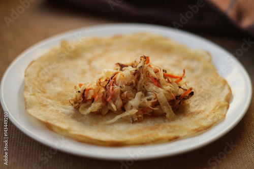 Pancakes with filling (stewed cabbage with vegetables)