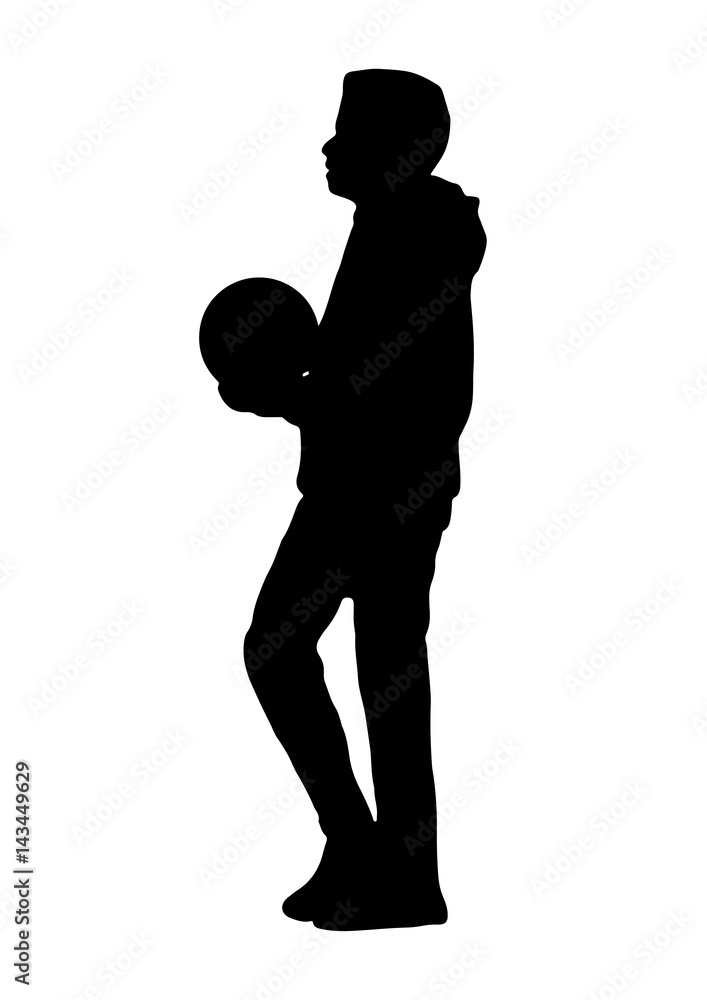 Silhouette of a teenager with a ball goes vector Silhouette of a teenager with a ball goes vector