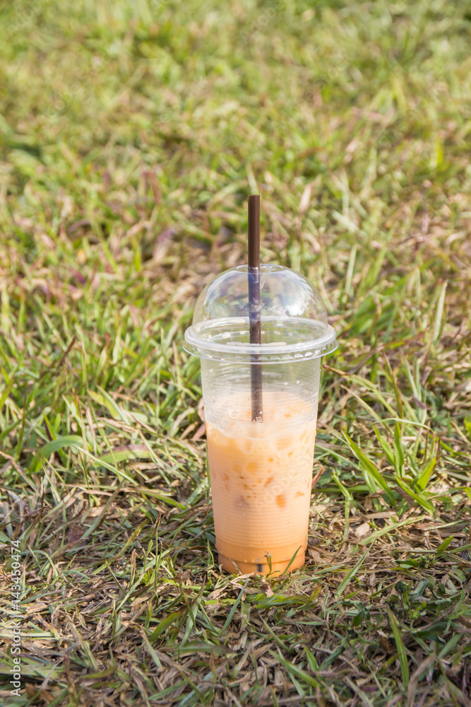 ice thai tea in plastic glass ice thai tea in plastic glass