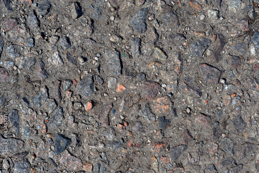 Crushed stone on the ground, texture background Crushed stone on the ground, texture background