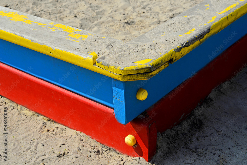 Sandbox, red blue yellow
