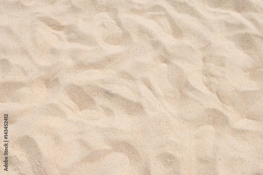 closeup of sand pattern of a beach in the summer closeup of sand pattern of a beach in the summer