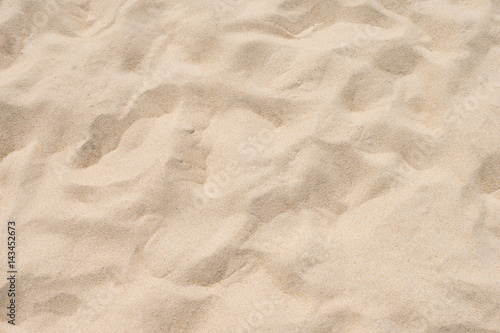 closeup of sand pattern of a beach in the summer