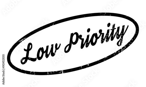 Low Priority rubber stamp. Grunge design with dust scratches. Effects can be easily removed for a clean, crisp look. Color is easily changed.