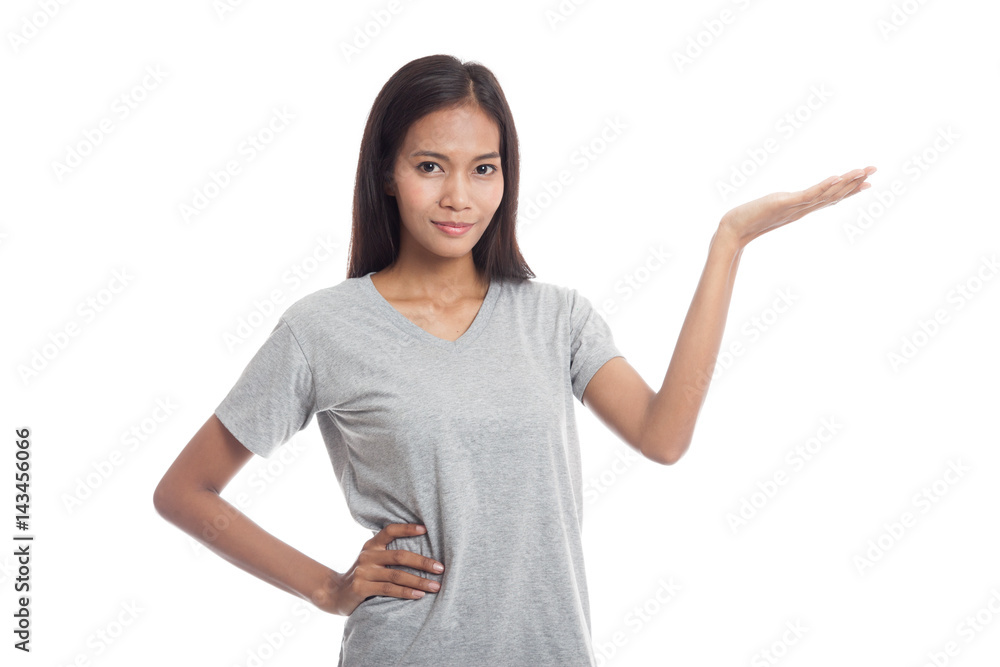 Young Asian woman present with her hand. Young Asian woman present with her hand.