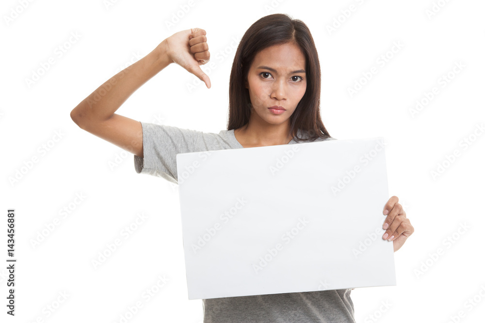 Young Asian woman show thumbs down with white blank sign. Young Asian woman show thumbs down with white blank sign.