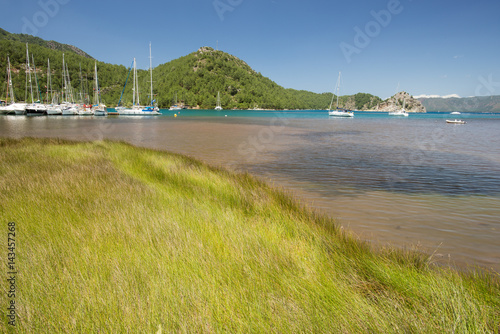 Scenic view of boats in Kızkumu Marmaris Turkey photo