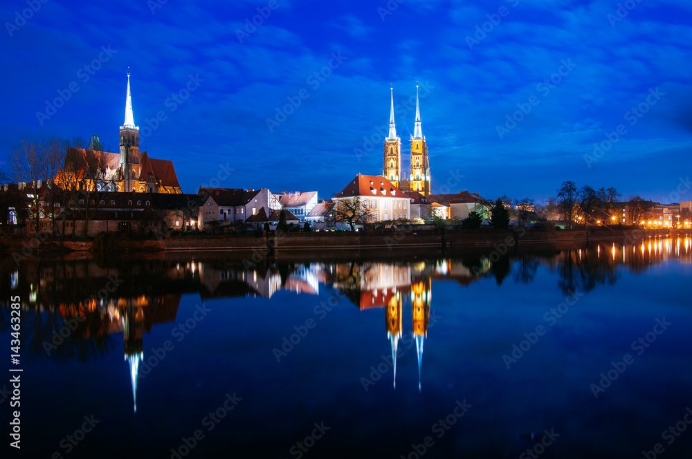 The Cathedral of St John Baptist by a full moon night Ostrow Tumski Wroclaw Breslau Poland The Cathedral of St John Baptist by a full moon night Ostrow Tumski Wroclaw Breslau Poland