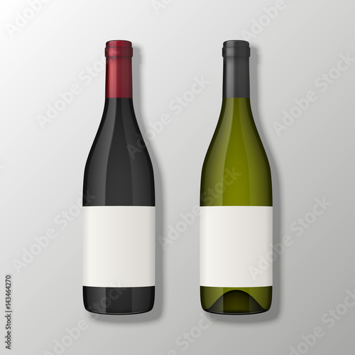 Two realistic vector wine bottles in top view with blank labels on gray background. Design template in EPS10.