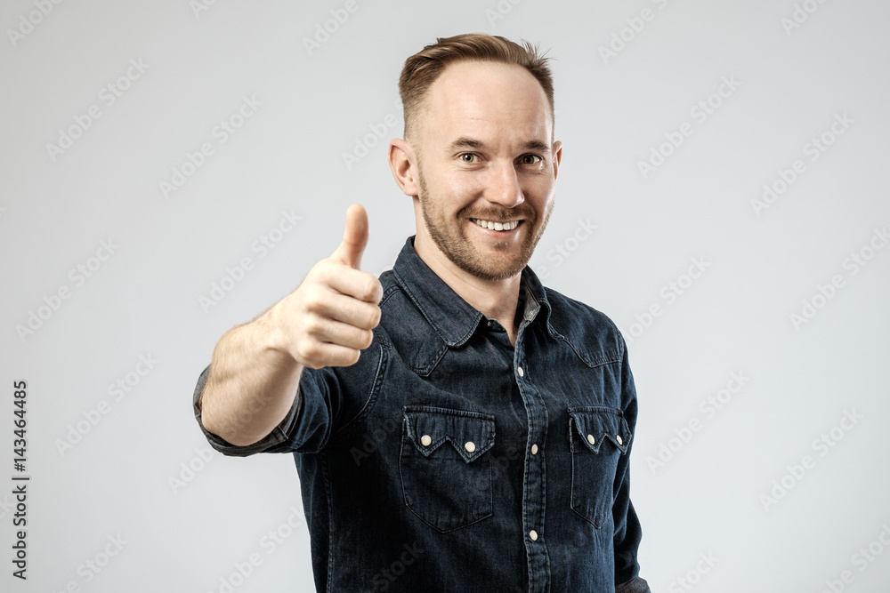 Happy young handsome man gesturing Happy young handsome man gesturing