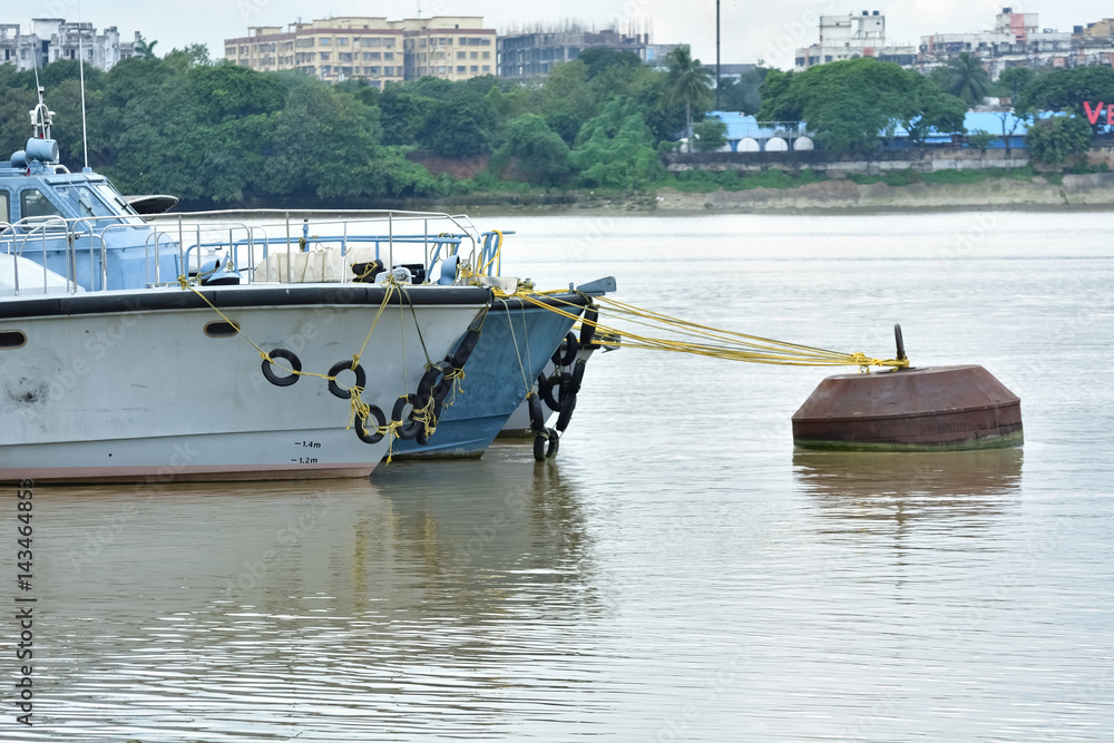 Boat floating on sea.