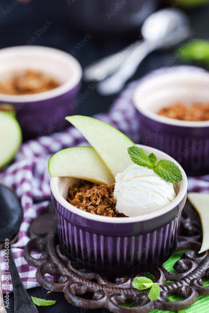 Apple crumble dessert with vanilla ice cream