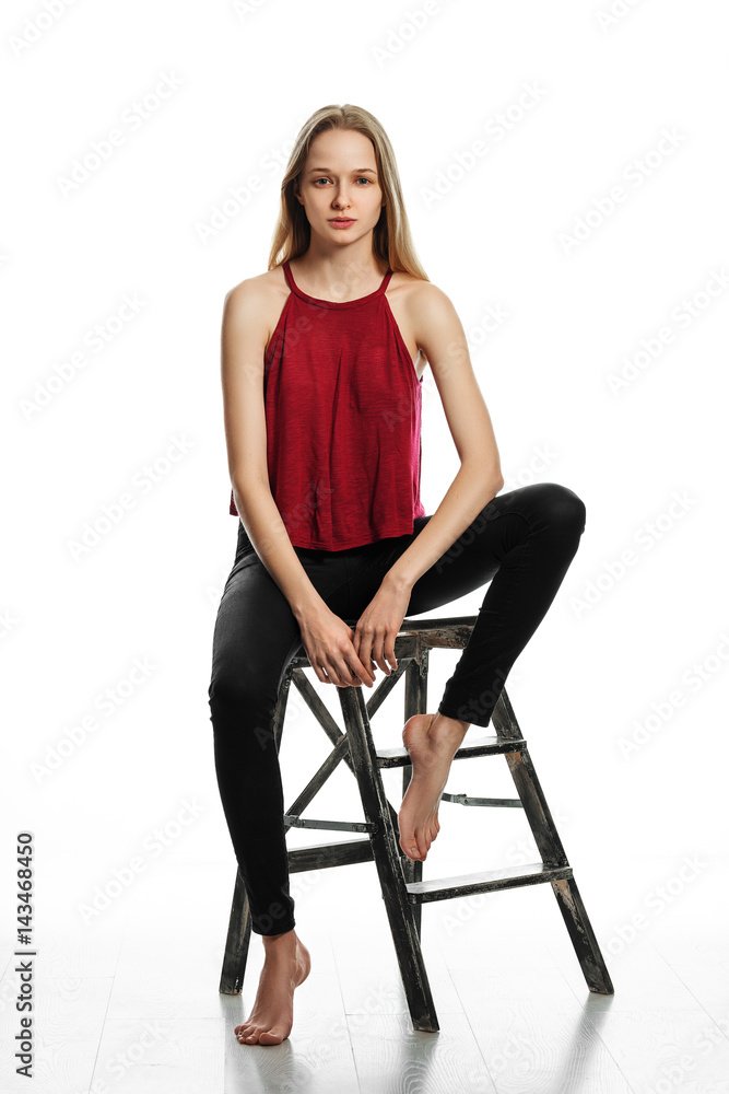 Portrait of a woman without makeup. Model test. Fashion model. White background.