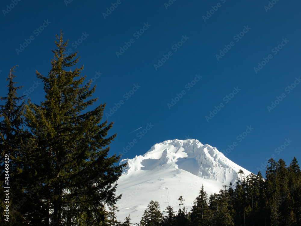 Snowy mountain with jet high above Snowy mountain with jet high above