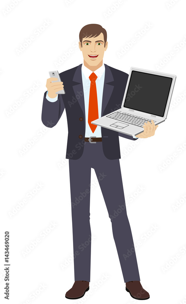 Businessman with mobile phone holding laptop notebook Businessman with mobile phone holding laptop notebook