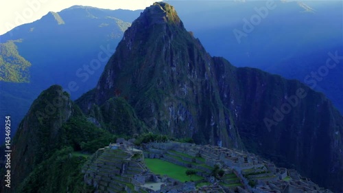 timelapse of machupichu with the sun in the background down the mountain HD photo