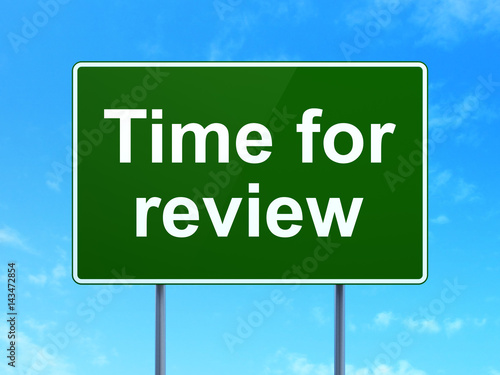 Time concept: Time for Review on road sign background