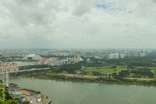 SINGAPORE - FEBRUARY 15, 2017: Aerial view of Singapore gulf and OCBC Arena from Marina Bay Sands Sky park. © umike_foto