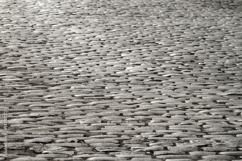 Cobblestones illuminated by moonlight