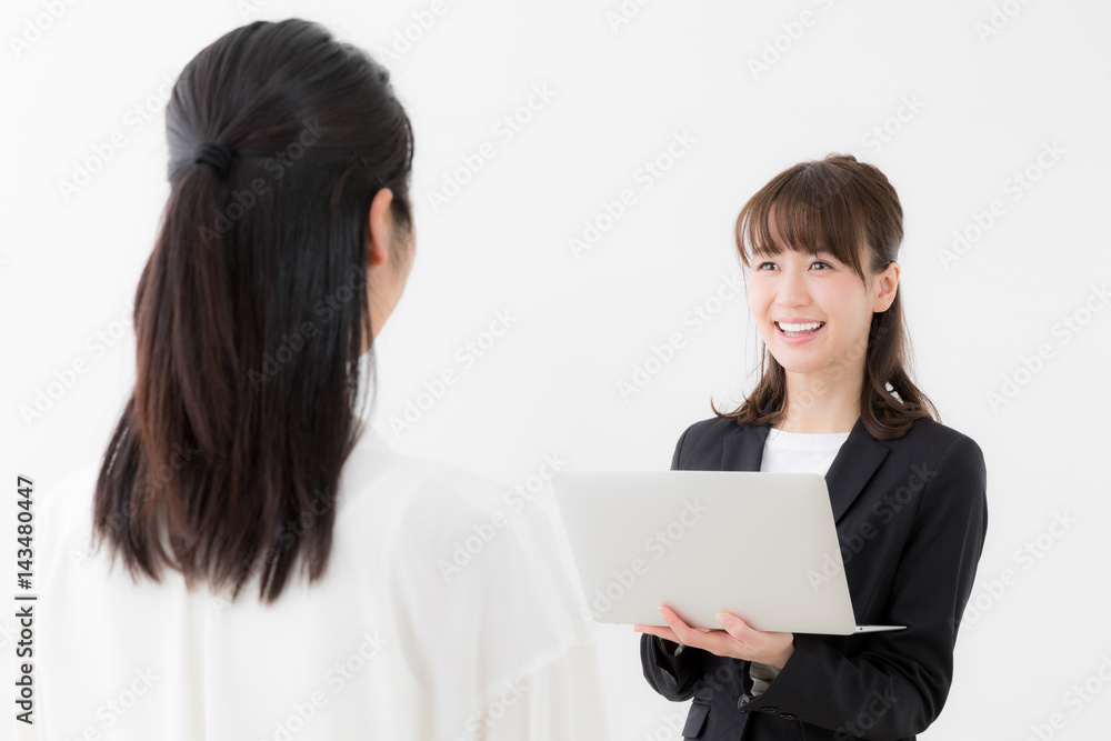 asian businesswomen talking on white background asian businesswomen talking on white background